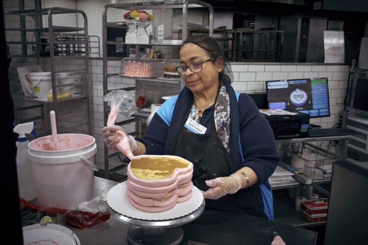 Walmart’s army of bakery  decorators take the cake when it comes to hourly store pay